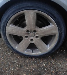 flat tyre on the driveway